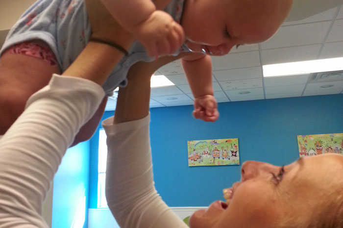 Baby Held By Doctor | Bright Future Pediatrics